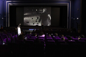 View of the dispositif Swipe to Swipe to ... in a movie theater