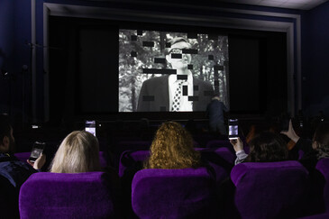 View of the dispositif Swipe to Swipe to ... in a movie theater