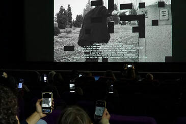 View of the dispositif Swipe to Swipe to ... in a movie theater