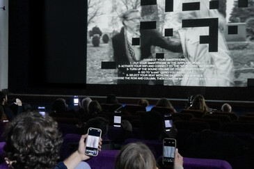 View of the dispositif Swipe to Swipe to ... in a movie theater